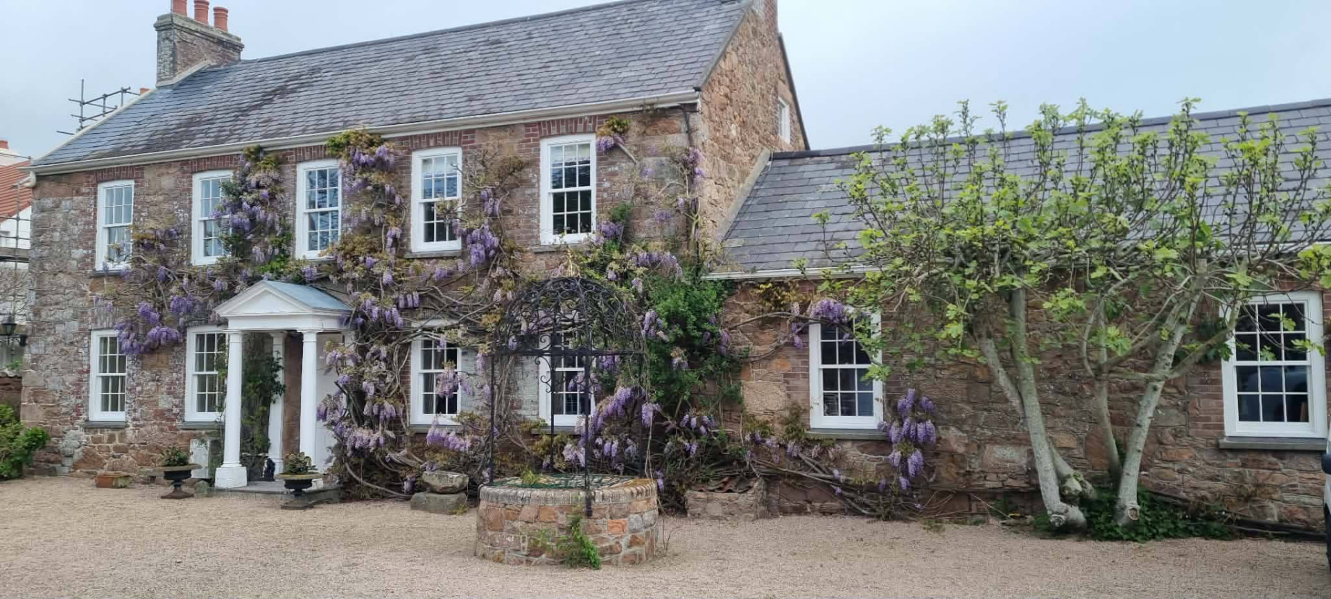 Completed Grade 4 listed Jersey farmhouse with newly installed replacement timber sash windows